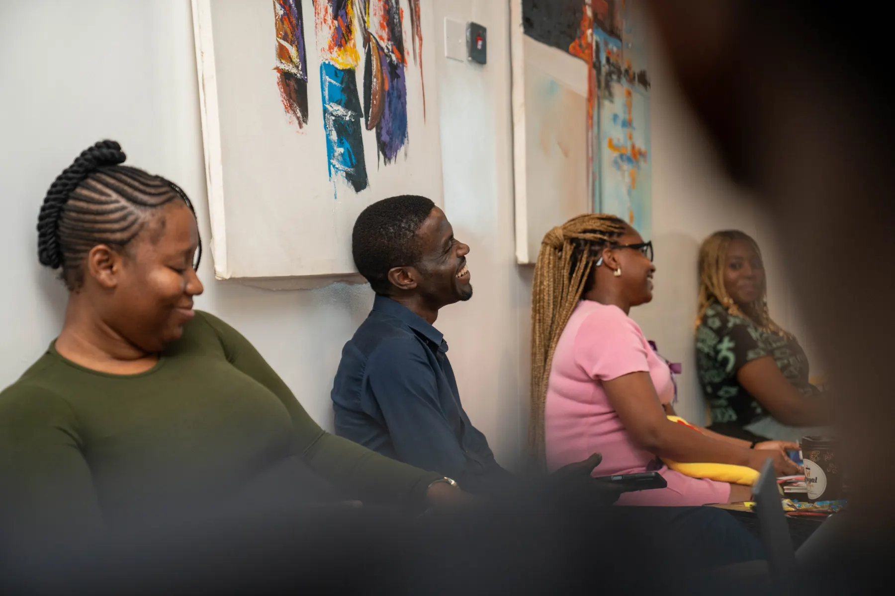 A room of people listening during a working session